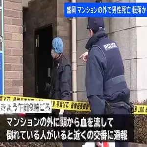 マンションの外に頭から血を流し倒れている男性